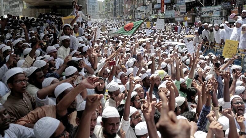 Supporters of the hardline Hefazat-e-Islam shout slogans after police prevented them from marching towards Myanmar Embassy to protest against the persecution of Rohingya Muslims, in Dhaka, Bangladesh, on Monday. Picture by AM Ahad, Associated Press. 