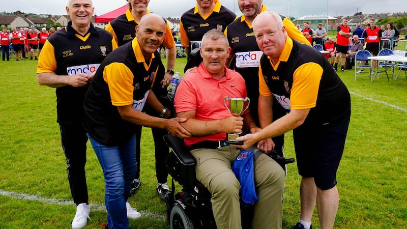 Marty (centre) at the 'Legends for Lyncho' match which included (l-r) Frank Mitchell, Billy Joe Padden, Joey Cunningham, Sean Cavanagh, Stevie McDonnell and Benny Tierney