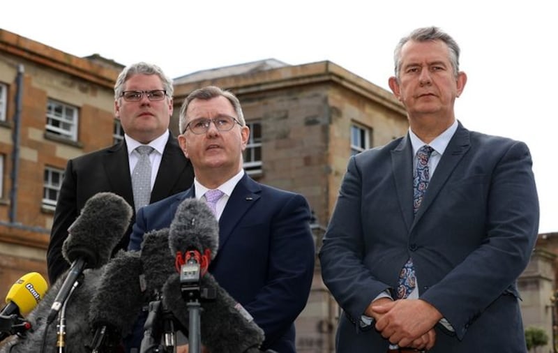 DUP leader Jeffrey Donaldson (centre) flanked by party colleagues Gavin Robinson and Edwin Poots speaking after a meeting with British Prime Minister Boris Johnson. Picture by Liam McBurney, PA