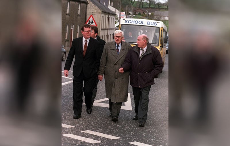  David Trimble (left) and Seamus Mallon with Tommy Canavan whose brother owned the Railway Bar in Poyntzpass where friends Philip Allen and Damien Trainor were shot dead by loyalists in 1998