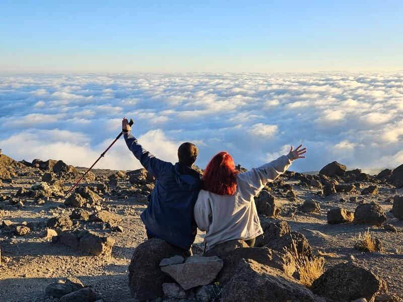 Harpist Siobhan Brady and her father, Sean, on the summit of Mount Kilimanjaro