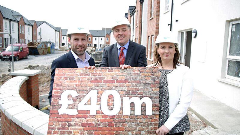 Announcing the Fold investment are (from left) Ciar&aacute;n Fox, director of the Royal Society of Ulster Architects; John McLean, chief executive of Fold Housing Association; and Heather Burton, director of Donaghmore Construction 