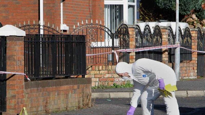 A forensic expert at the scene of the stabbing on Cullingtree Road, west Belfast. Picture by Ann McManus 