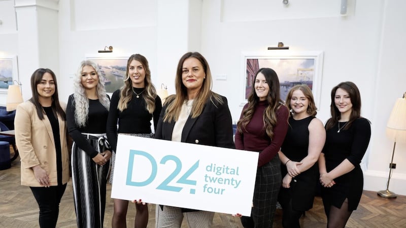 Digital 24 managing director Niamh Taylor (centre) is joined by team members Megan Coyle, Cara Jackson, Darragh Bennett, Donna Barton, Laura McCourt and Meghan Semple as the agency unveils its new visual identity. Picture: Kelvin Boyes/Press Eye 