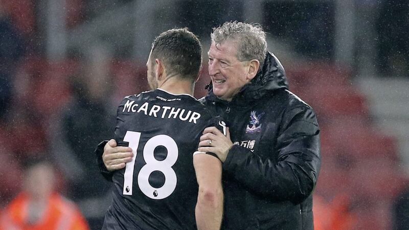 Crystal Palace manager Roy Hodgson celebrates victory over Southampton with goalscorer James McArthur 