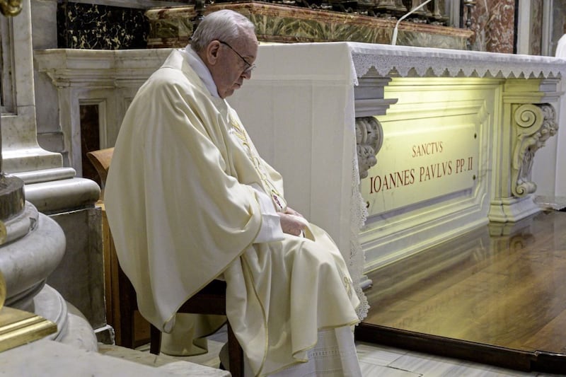 Pope Francis meditates as he celebrates a Mass for the 100th anniversary of the birth of Pope John Paul II. Picture by Vatican Media via AP 