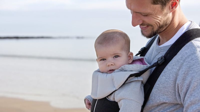 &#39;Wearing&#39; a baby in a sling is among the practices those who support attachment parenting advocate but simply responding to young children sensitively and consistently works too 