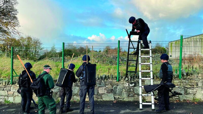 Army search teams assisted by the PSNI at the scene, following the attempted murder of two officers in Strabane. Picture date: Friday November 18, 2022. PICTURE: David Young/PA.