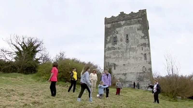 Ukrainian families playing in the ground of Ballindooley Castle in Co Galway 