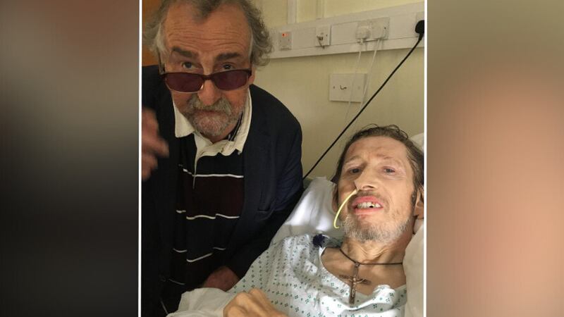Shane MacGowan posts hospital photo with friend for his birthday while receiving ongoing treatment.