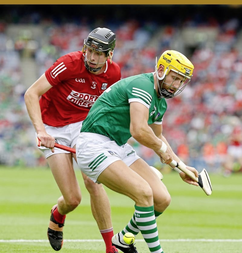 Cork's Robert Downey and Limerick's Seamus Flanagan fight for possession Picture: Philip Walsh.