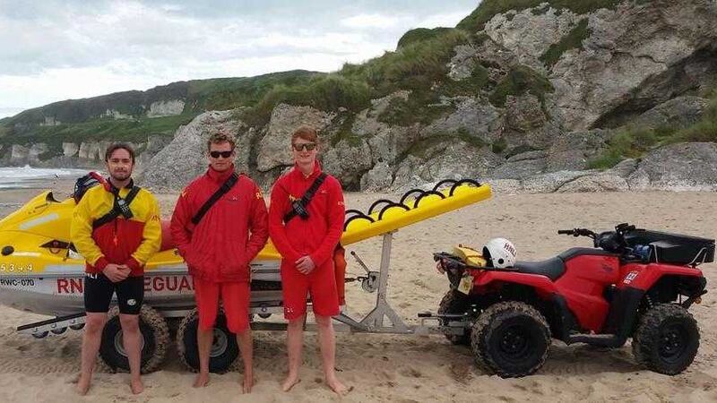 RNLI lifeguards, from left, Bosco McAuley, Ali Boyd and Stephen Parish following the rescue at Whiterocks beach yesterday. Picture by RNLI   