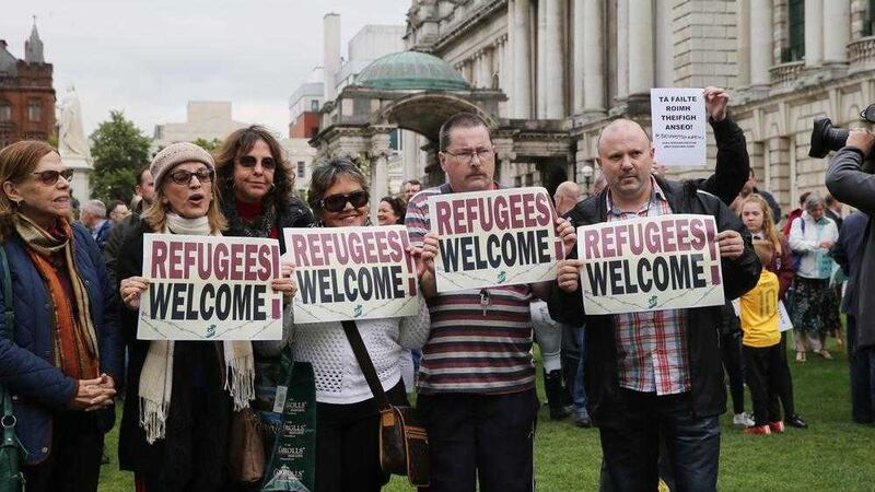 A &#39;Refugees Welcome&#39; vigil at Belfast City Hall. Picture by Hugh Russell 