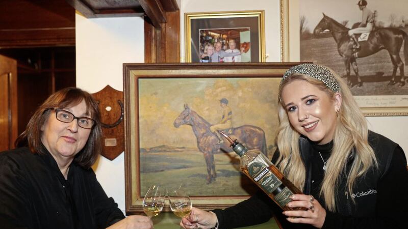 Denise O&rsquo;Neill, proprietor of the Londonderry Arms Hotel in Carnlough, and Bushmills brand ambassador Lauren McMullan launch the Arkle Whiskey Bar in the heart of the Glens of Antrim. Photo: Bill Smyth 