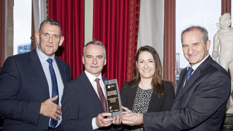 Pictured with the sustainably-styled environmental award are Declan Cunningham, head of sustainability &amp; risk at Moy Park; Chris Conway, chair of BICNI; Suzanne Huntley, safety engineer at NIE Networks; and David Small, Northern Ireland Environmental Agency chief executive 
