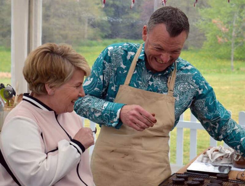 Chris shares a joke with Sandi during episode two of this year’s The Great British Bake Off
