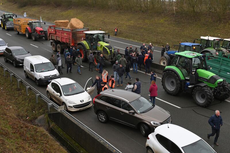 Farmers blocked a road during a demonstration near Beauvais in northern France on Tuesday (Matthieu Mirville/AP)
