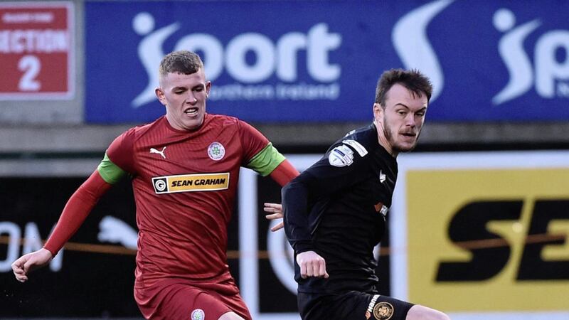 Action from last weekend&#39;s IPL game between Cliftonville and Carrick. Pictured are Cliftonville&#39;s Aaron Donnelly and Carrick&#39;s Lee Chapman 
