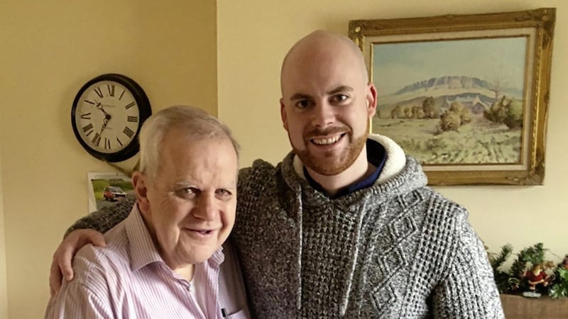Fr John Irwin pictured with Dungiven Mass goer Se&aacute;n McElhinney 