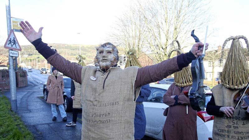 Cleamair&iacute; Feirste - the Belfast Wren Boys &ndash; perform their midwinter ritual at the Shaw&#39;s Road Gaeltacht in west Belfast. Picture by Mal McCann 