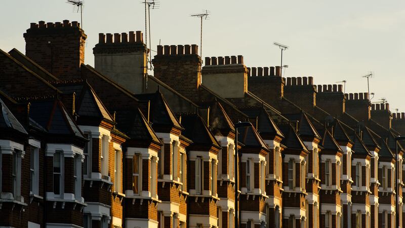 The cost of a typical house is 6.7 times average earnings in Britain despite the recent slowdown in the property market, according to new figures from mortgage lender Halifax (Dominic Lipinski/PA)