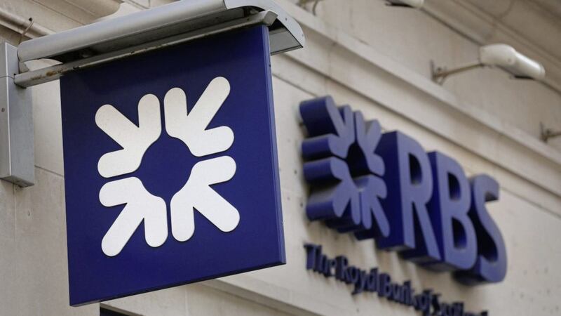 Royal Bank of Scotland has reported a &pound;752 million annual profit, with the lender swinging out of the red for the first time in a decade 
