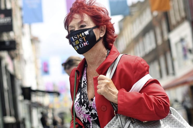 France eases mask rules and announces end to nightly virus curfew