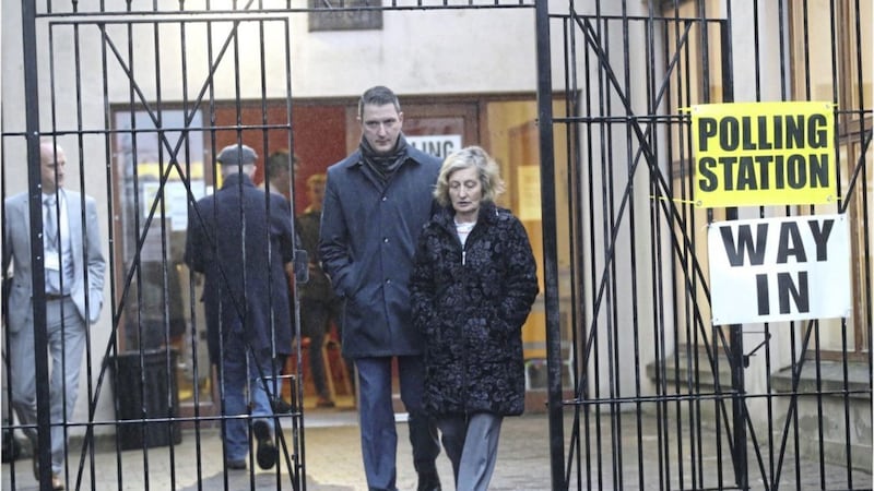 Sinn F&eacute;in&#39;s John Finucane with his mother Geraldine leaving a polling station in North Belfast 