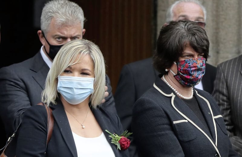 Northern Ireland Deputy First Minister Michelle O&#39;Neill and First Minister Arlene Foster wearing face coverings during the funeral of John Hume at St Eugene&#39;s Cathedral in Londonderry. PA Photo. Picture date: Wednesday August 5, 2020. Hume was a key architect of Northern Ireland&#39;s Good Friday Agreement and was awarded the Nobel Peace Prize for the pivotal role he played in ending the region&#39;s sectarian conflict. He died on Monday aged 83, having endured a long battle with dementia. See PA story FUNERAL Hume. Photo credit should read: Niall Carson/PA Wire. 