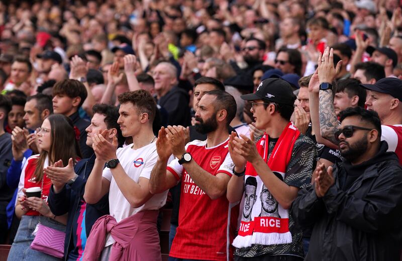 Fans applaud on the 14th minute during Arsenal’s Premier League match against Bournemouth in memory of 14-year-old Daniel Anjorin