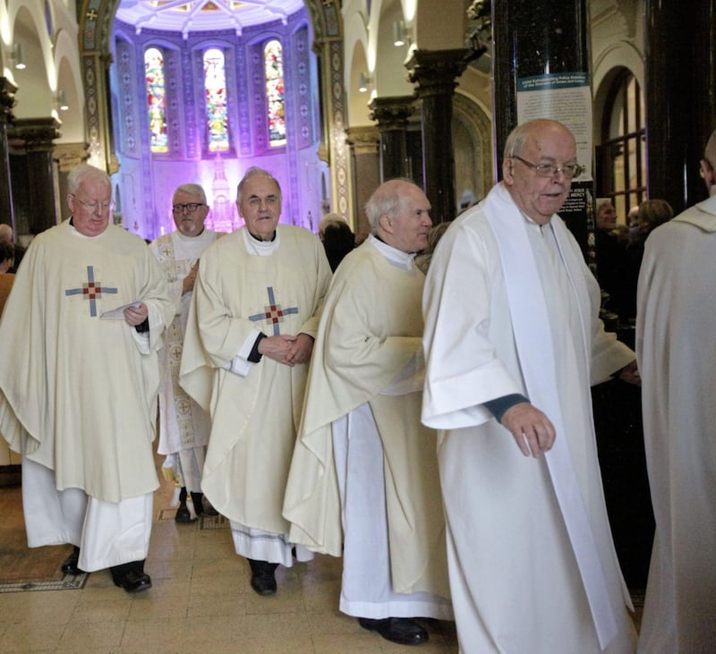 Clergy, including former rector Fr Aidan Troy, at the Holy Cross Mass of Thanksgiving. Picture by Ann McManus 