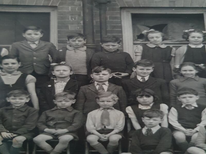 Black and white photo of Ernie and his classmates at school