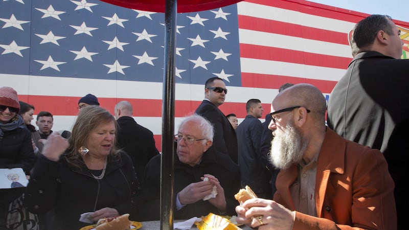 Democratic presidential candidate Senator&nbsp;Bernie Sanders, his wife Jane and REM singer Michael Stipe get a hot dog at Nathans Famous in Coney Island in the Brooklyn borough of New York. Picture by&nbsp;Mary Altaffer, Associated Press&nbsp;