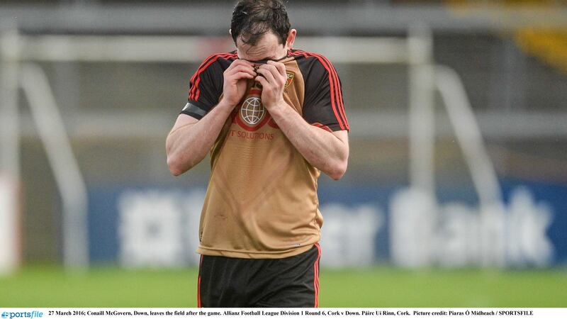 Down&rsquo;s Conaill McGovern leaves the Pairc Ui Rinn pitch after Sunday&rsquo;s defeat to Cork<br />Picture by Sportsfile