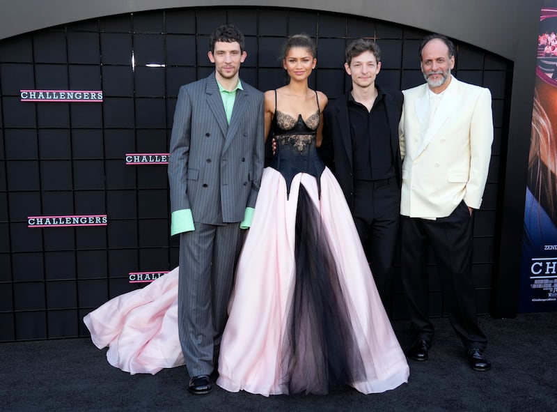 Luca Guadagnino, director of Challenges, poses with cast members (Chris Pizzello/AP)