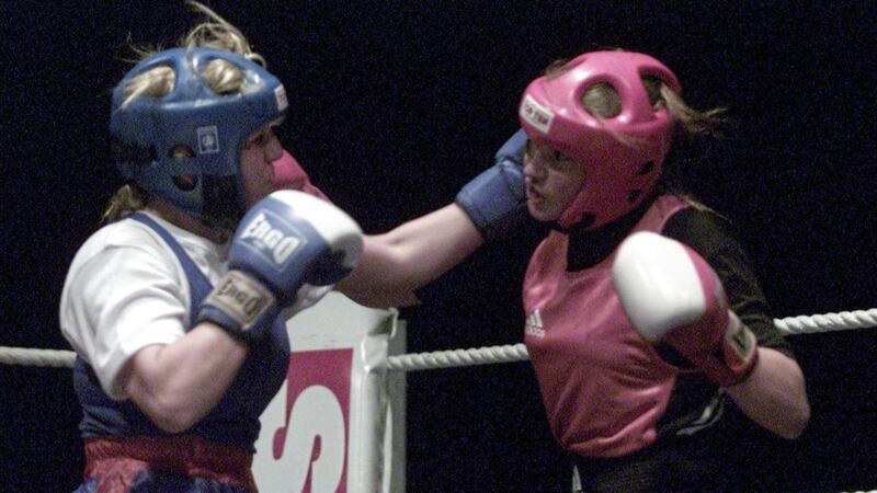 Katie Taylor and Alanna Audley goe toe-to-toe during their historic 2001 showdown at the National Stadium - the first-ever sanctioned female fight in Ireland. Picture by Inpho 