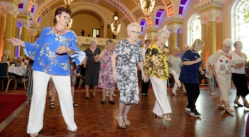 A tea dance at Belfast City Hall yesterday organised by Good Morning West Belfast and sponsored by The Irish News. Picture by Mark Marlow. 