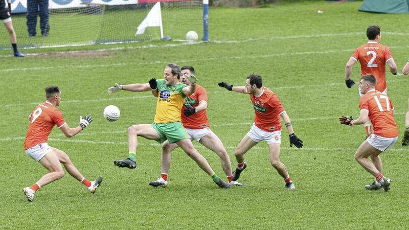 Marked man. Donegal&#39;s Michael Murphy surrounded by Stephen Sheridan, Aidan Forker, Jamie Clarke and Greg McCabe of Armagh in the 2020 meeting at Kingspan Breffni. Picture Margaret McLaughlin. 