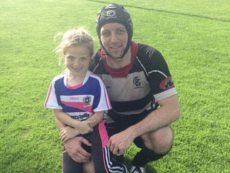 Paddy Murray, pictured with his daughter Niamh, playing rugby with Cooke 