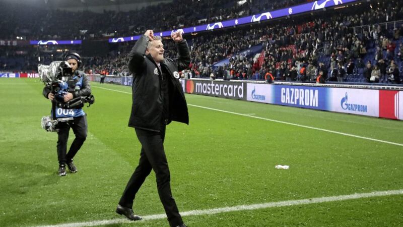 Manchester United caretaker manager Ole Gunnar Solskjaer celebrates after the final whistle during the UEFA Champions League match at the Parc des Princes 