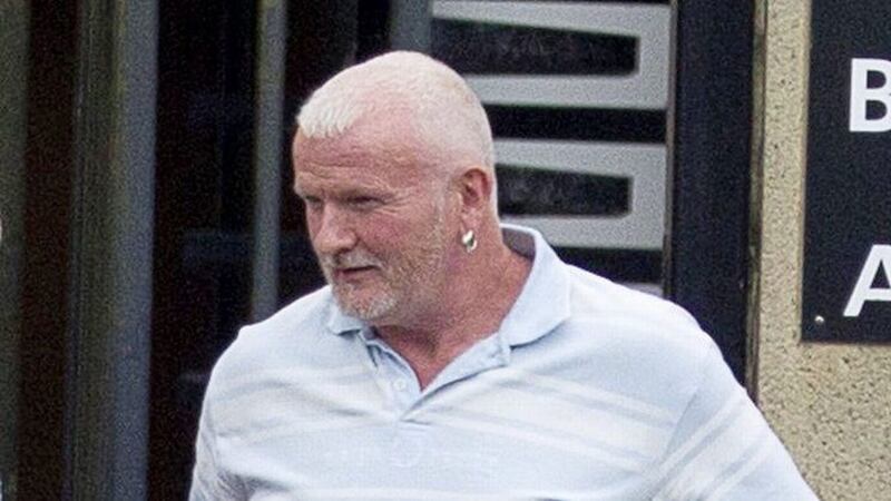 Murder victim Malcolm McKeown shot at least six times as he sat in his BMW, trial hears