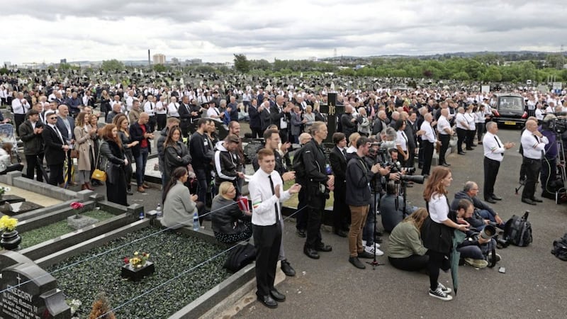 A crowd listening to former Sinn Fein president Gerry Adams speak during the funeral of former leading IRA figure Bobby Storey. Picture by Liam McBurney/PA Wire 