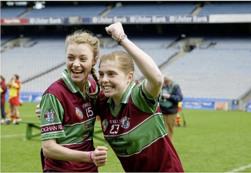CHAMPIONS: Katie Mullan (right) with Rosanna McAleese (No 15) after they had helped Eoghan Rua, Coleraine win the 2011 All-Ireland Intermediate Camogie Club title at Croke Park, Dublin 