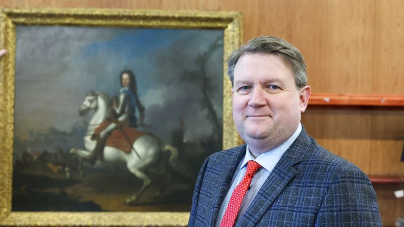 Bloomfield Auctions’ managing director Karl Bennett with a 17th century portrait of King William III that will go under the hammer next week
