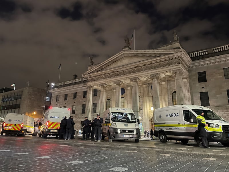 Gardaí outside the General Post Office on O’Connell Street in Dublin following violent scenes in the city centre on Thursday evening