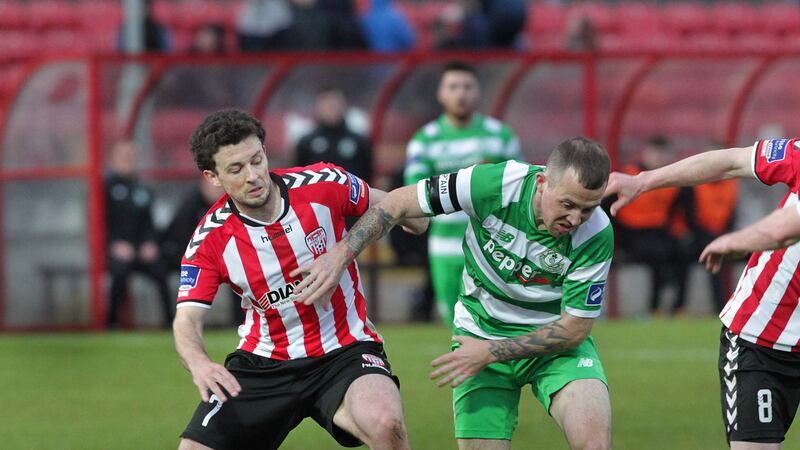 Derry City's Barry McNamee with Gary McCabe of Shamrock Rovers at the Brandywell on Friday night. Picture by Margaret McLaughlin   &nbsp;