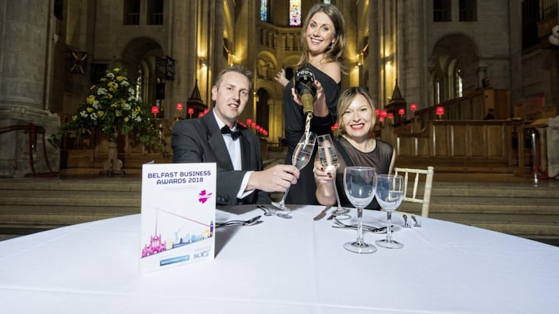 Preparing for the Belfast Business Awards in St Anne&#39;s Cathedral on April 27 are (seated) Paul McClurg (Bank of Ireland) and Michelle Greeves (Belfast Chamber of Trade) with event host Sarah Travers 