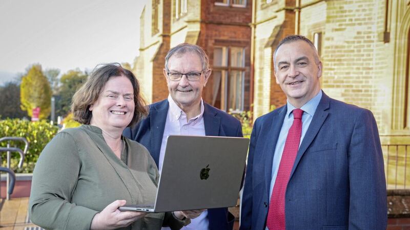 Highlighting the urgent need to address growing digital poverty across the north are Advice NI chief executive Bob Stronge (centre) with Patricia Donald, its head of ICT, and Patrick Rooney, deputy secretary of work and health for DfC. Picture: Matt Mackey/PressEye 
