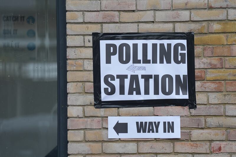 A sign marks the entrance to the polling station at St Albans Church, south London