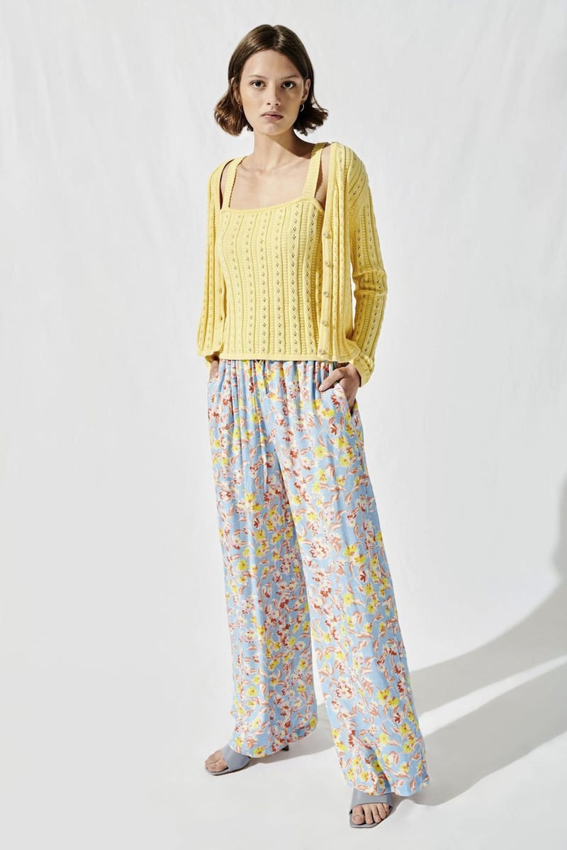 Omnes Knitted Button Front Cardigan Buttermilk, &pound;45; Knitted Pointelle Cami Top Buttermilk, &pound;38; Wide Leg Trousers in Blue Daisy, &pound;55, available from Omnes